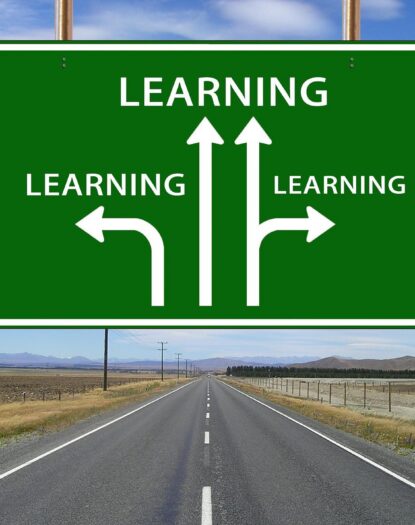 Road sign with learning arrows